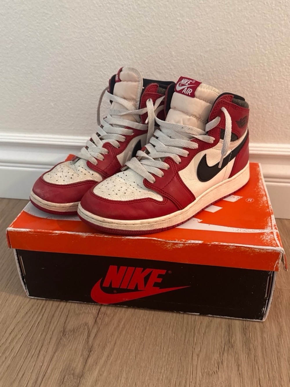 Nike Air Jordan 1 High OG Red White Black Sneakers. List and found